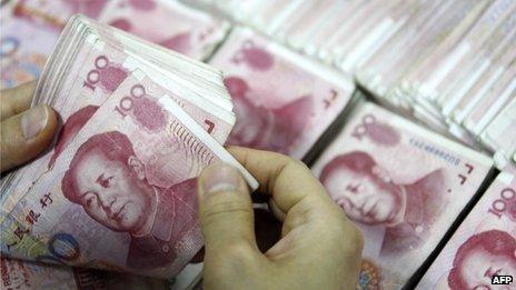 Yuan notes being counted