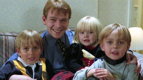 Adam Woodyatt with on-screen children