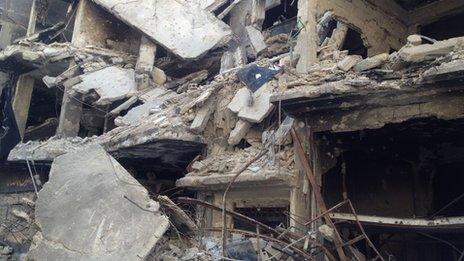 Damaged buildings in Yarmouk refugee camp