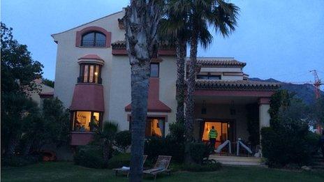 Police search the luxury home of a suspected criminal in Marbella, Spain