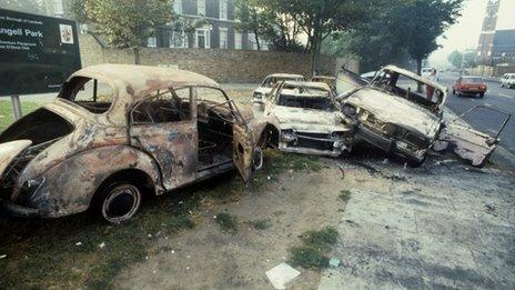 Burned-out cars after the Brixton riots