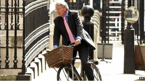 Andrew Mitchell on a bicycle