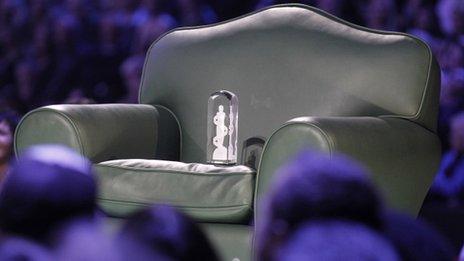 Bieber's Juno fan choice award on a chair at the awards