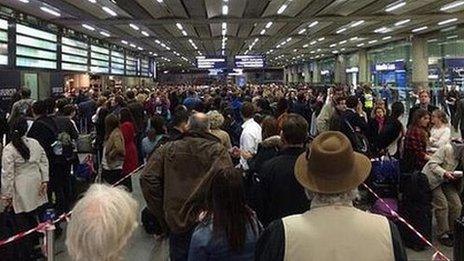 Queues of people at St Pancras Station