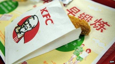 A KFC bag containing a chicken wing