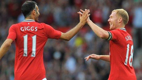 Ryan Giggs and Paul Scholes celebrate for Manchester United during the 2012-13 season
