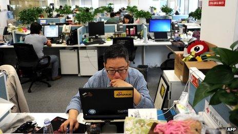 A worker at the Sina Weibo office