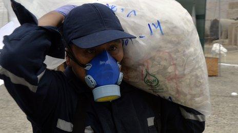 Man carrying a sack of drugs