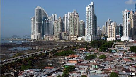 High rise towers in Panama City overlook a major slum area