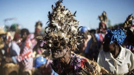 Malawian traditional dancers perform during the last campaign rally of of presidential candidate Peter Mutharika on 17 May 2014 in Goliati