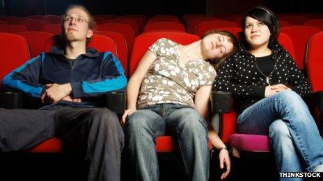 People sleeping in theatre