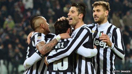 Juventus players celebrate a goal