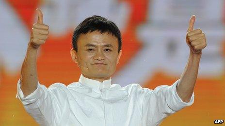 Alibaba founder Jack Ma gives a thumbs up