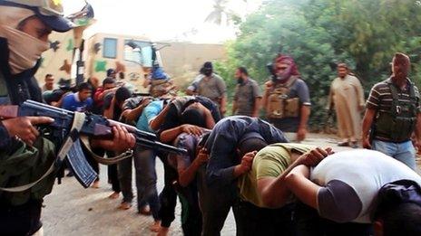 Image purportedly show ingmilitants from the al-Qaeda-inspired Islamic State of Iraq and the Levant (ISIL) leading away captured Iraqi soldiers dressed in plain clothes (14 June 2014)