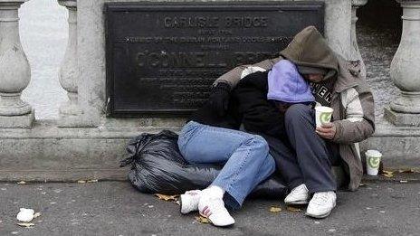 Homeless people begging for money on O'Connell bridge in central Dublin (file photo)