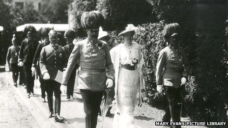 Archduke Franz Ferdinand and his wife walking along with others in Sarajevo before their assassination.