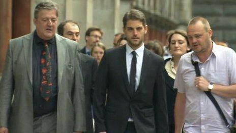 Paul Chambers arriving at court with Stephen Fry and Al Murray