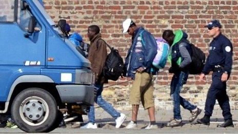 French police expel illegal migrants from their camp in Calais (2 July 2014)