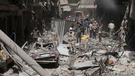 Destruction following a reported barrel-bomb attack by Syrian government forces in Aleppo