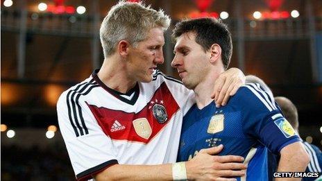 Germany's Bastian Schweinsteiger and Argentina's Lionel Messi