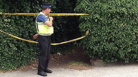 A PCSO at the scene of the investigation