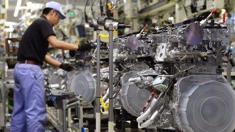 An employee of Toyota Motor's subsidiary Toyota Motor Kyushu at the Kanda Plant in Kanda, Fukuoka Prefecture, on August 7, 2014