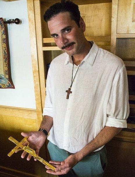Chris Catrambone with the crucifix