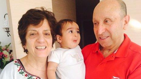 Yasmin and Khalid, with their granddaughter