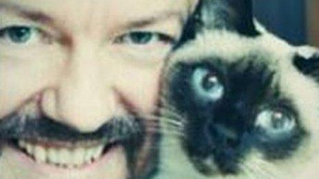 Ricky Gervais with his cat selfie