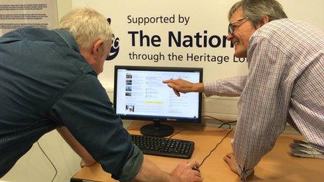Volunteers Alan Renton (right) Kenn Shearer working on the online facility