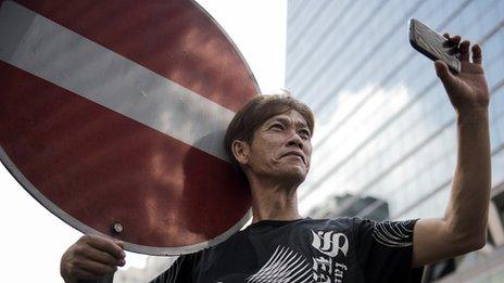 Hong Kong protester using phone