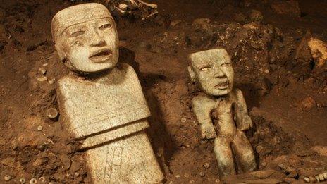 Handout picture released by the National Institute of Anthropology and History (INAH in Spanish) showing stone sculptures found at the Temple of the Feathered Serpent (Serpiente Emplumada) at the Teotihuacan complex in Mexico City, taken on November 19, 2013.