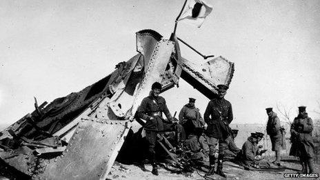 British and Japanese officers by a wrecked German gun after the siege of Tsingtao