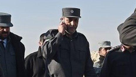 Kabul's police chief general Zahir Zahir speaking on a telephone (November 2014)