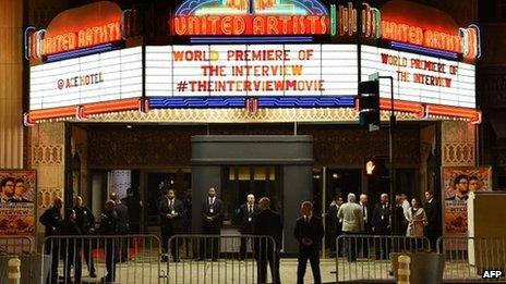 Security is seen outside The Theatre at Ace Hotel before the premiere of the film "The Interview" in Los Angeles, California, on 11 December 2014