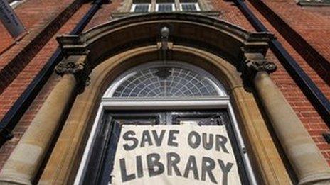 Save our library sign