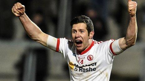 Tyrone captain Sean Cavanagh celebrates at the final whistle in Armagh