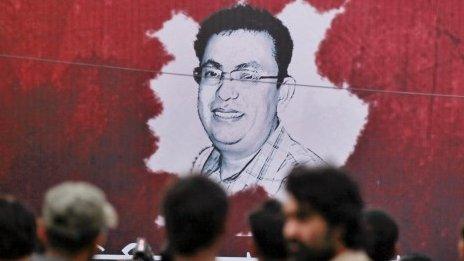 Poster displaying a portrait of Avijit Roy in Dhaka (27 February 2015)