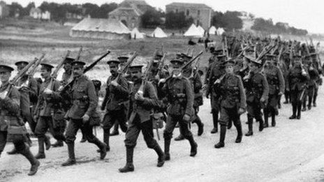 British infantrymen marching towards the front lines in the River Somme valley