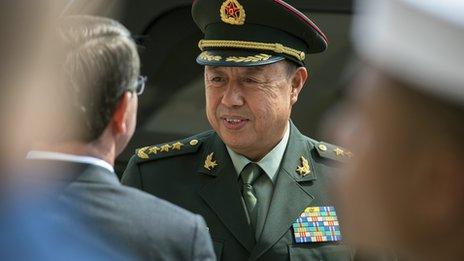 Gen Fan Changlong speaks with an official during his visit to Washington