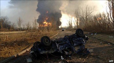 A burnt out car near the Buncefield depot