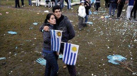 Fans in Montevideo react after the Uruguay-Holland match
