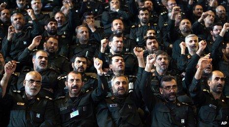 Iranian Revolutionary Guard commanders chant slogans during a meeting with President Mahmoud Ahmadinejad. File photo