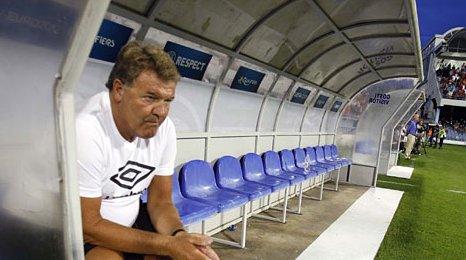 John Toshack cuts a forlorn figure during the 1-0 defeat to Montenegro in Podgorica