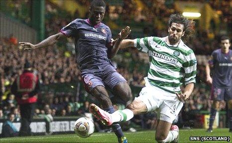 Celtic's Georgios Samaras slides in on Alexander Tettey of Rennes