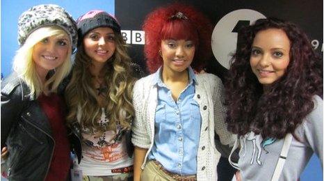 Little Mix in the Radio 1 Newsbeat studio.