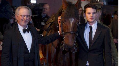 Steven Spielberg, Jeremy Irvine, with horse