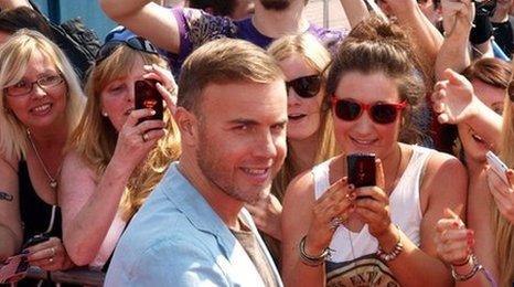 Gary Barlow meeting fans outside the auditions