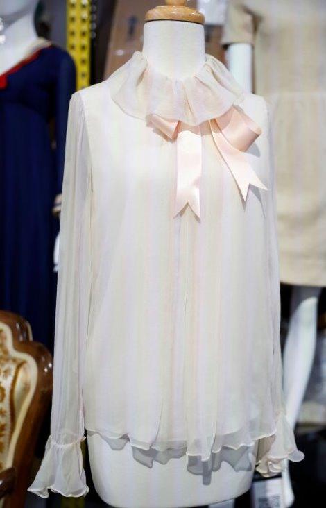 A Princess Diana engagement portrait-worn Emanuel blouse is displayed during an auction preview titled 'Hollywood Legends' at Julien's Auctions in Gardena, California, USA, 12 December 2023.