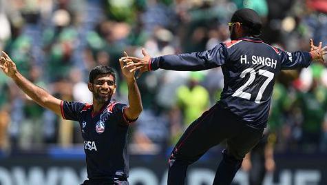 Saurabh Netravalkar of USA celebrates with teammate Harmeet Singh after USA defeat Pakistan in a super over during the ICC Men's T20 Cricket World Cup West Indies & USA 2024 match between USA and Pakistan at Grand Prairie Cricket Stadium on June 06, 2024 in Dallas, Texas